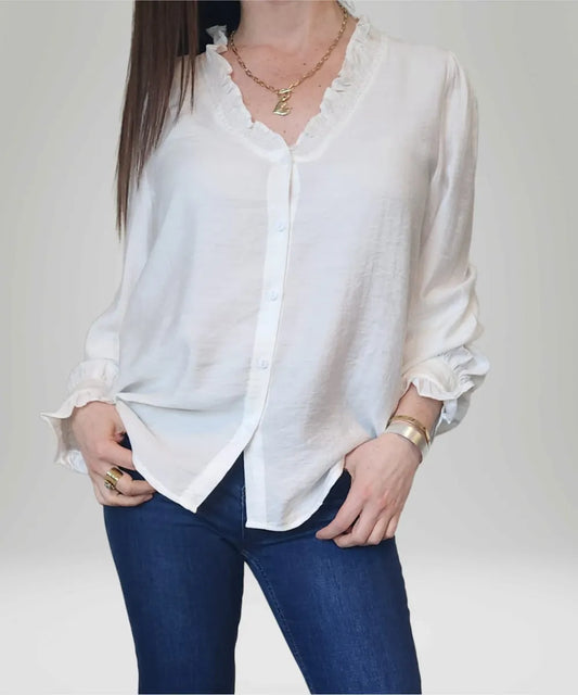 Blusa blanca con vuelitos